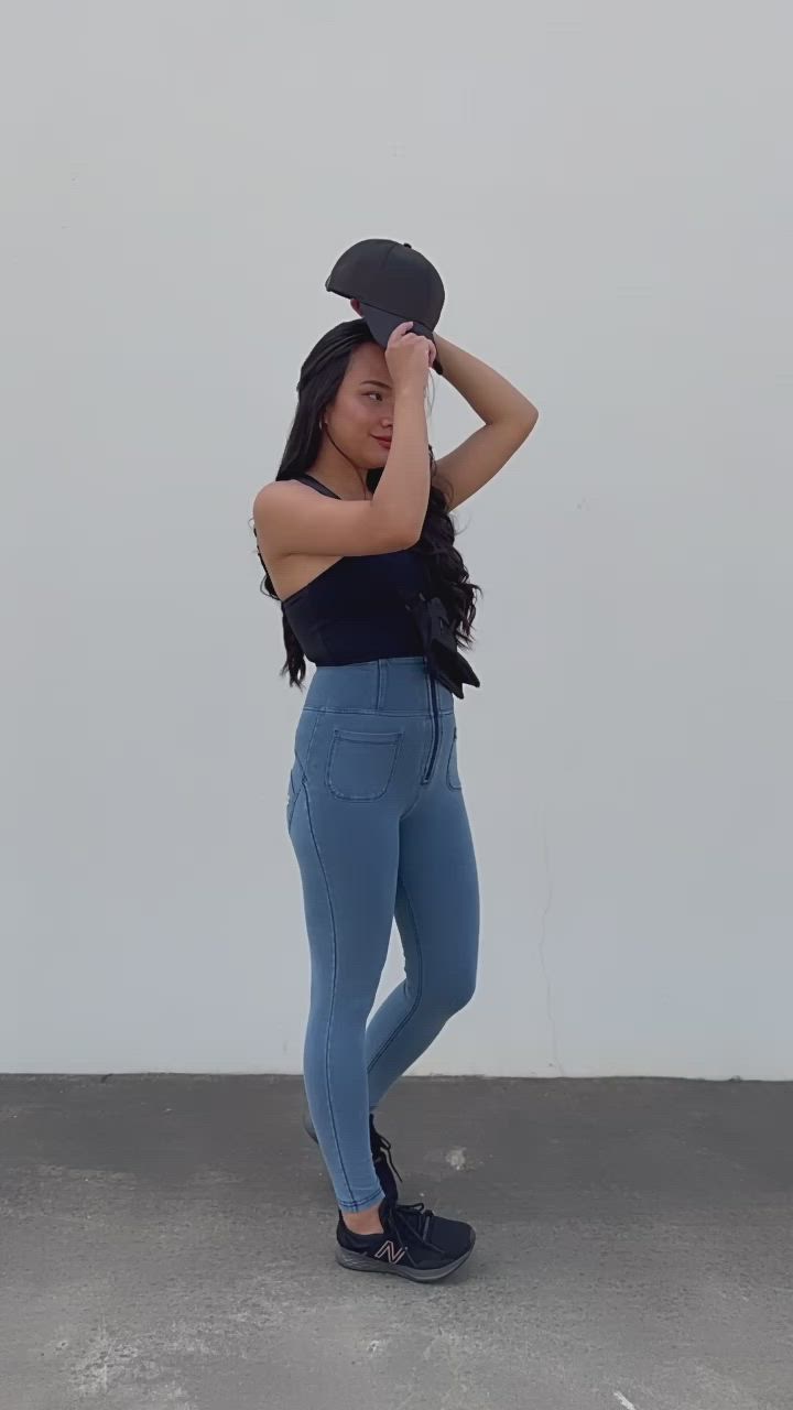 This contains: The model in the video is showing how her new booty pants made a statement on her outfit and how comfy it is