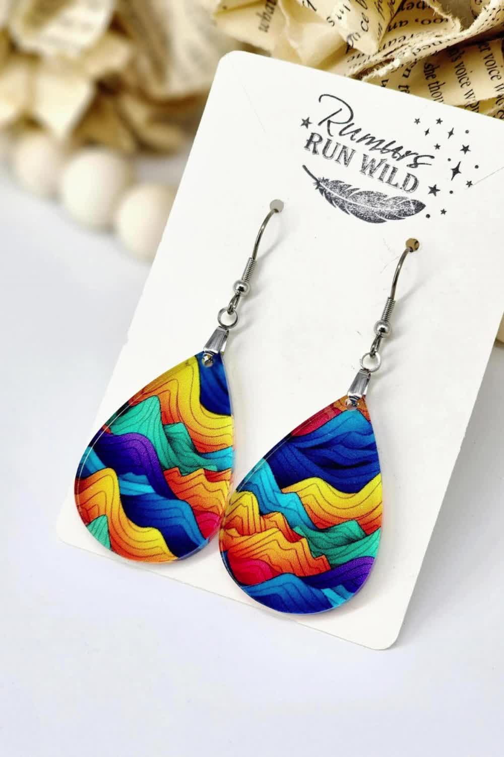 These lightweight Teardrop Earrings are made from a printed acrylic. They are lightweight and hypoallergentic. These handmade earrings make great gifts or a colorful addition to any wardrobe. You can get yours in my Shop.