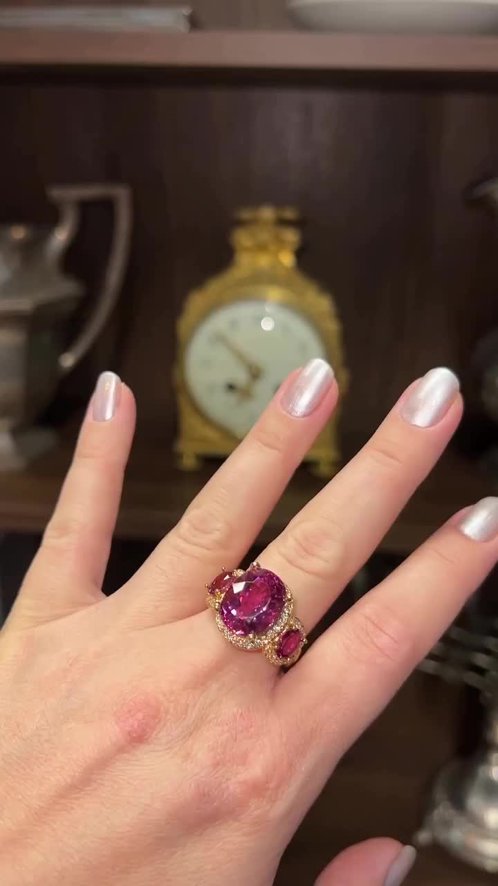 Indulge in the beauty of this exquisite estate cocktail ring, crafted from 18K yellow gold and adorned with a dazzling 6.00 TCW rubellite and 0.70 TCW diamonds. A perfect blend of luxury and style, this ring is designed to impress and enchant. #18KGold #RubelliteJewelry #DiamondCocktailRing