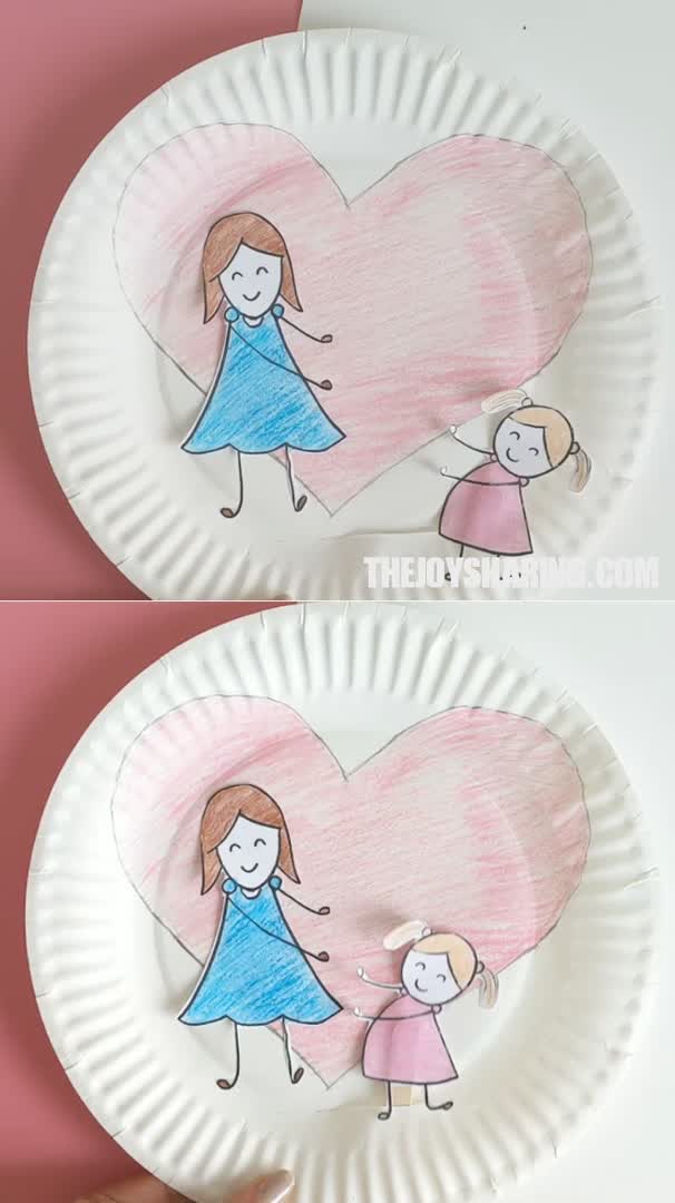 This may contain: two paper plates with children's drawings on them