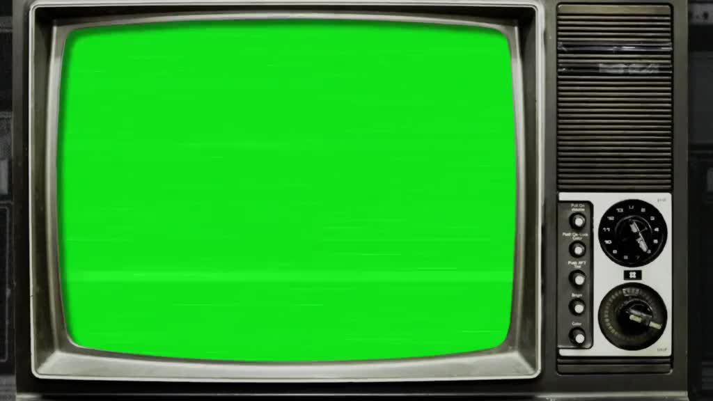 This may contain: an old fashioned television with green screen