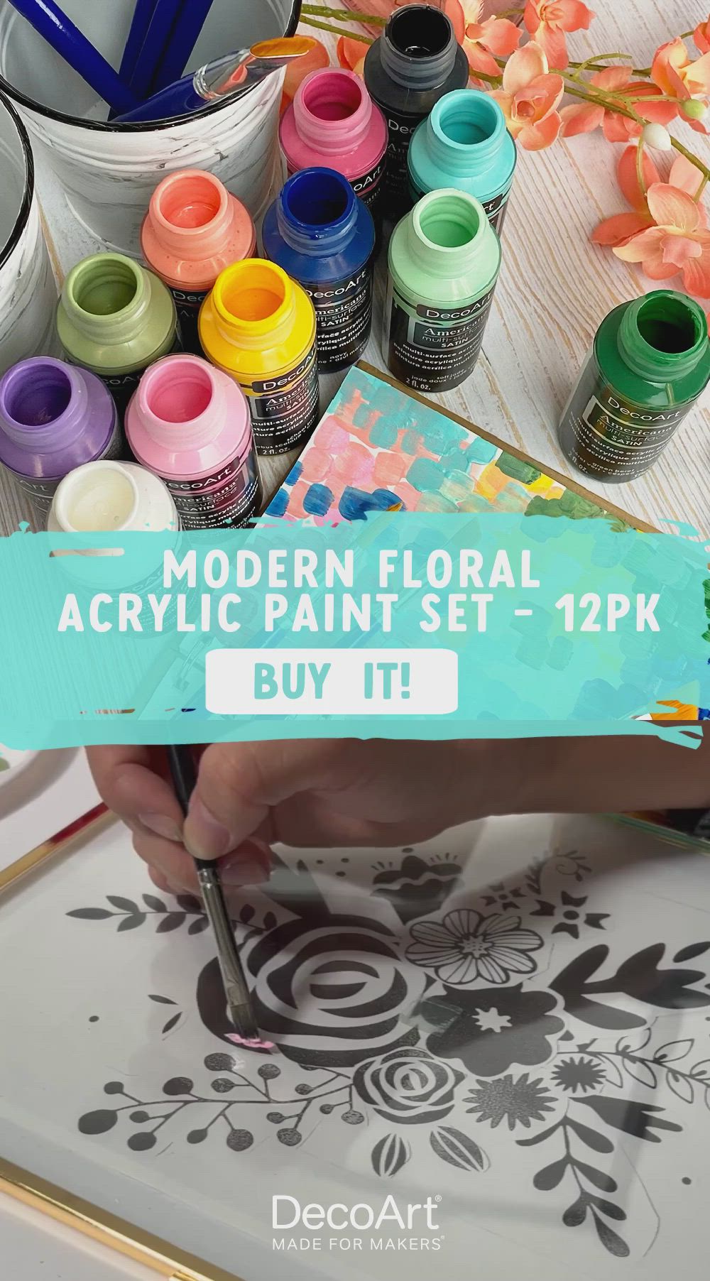 This contains: Image at the top picturing 12 pastel floral colored acrylic paint bottles. Below is a video of modern florals being painted onto a glass frame.