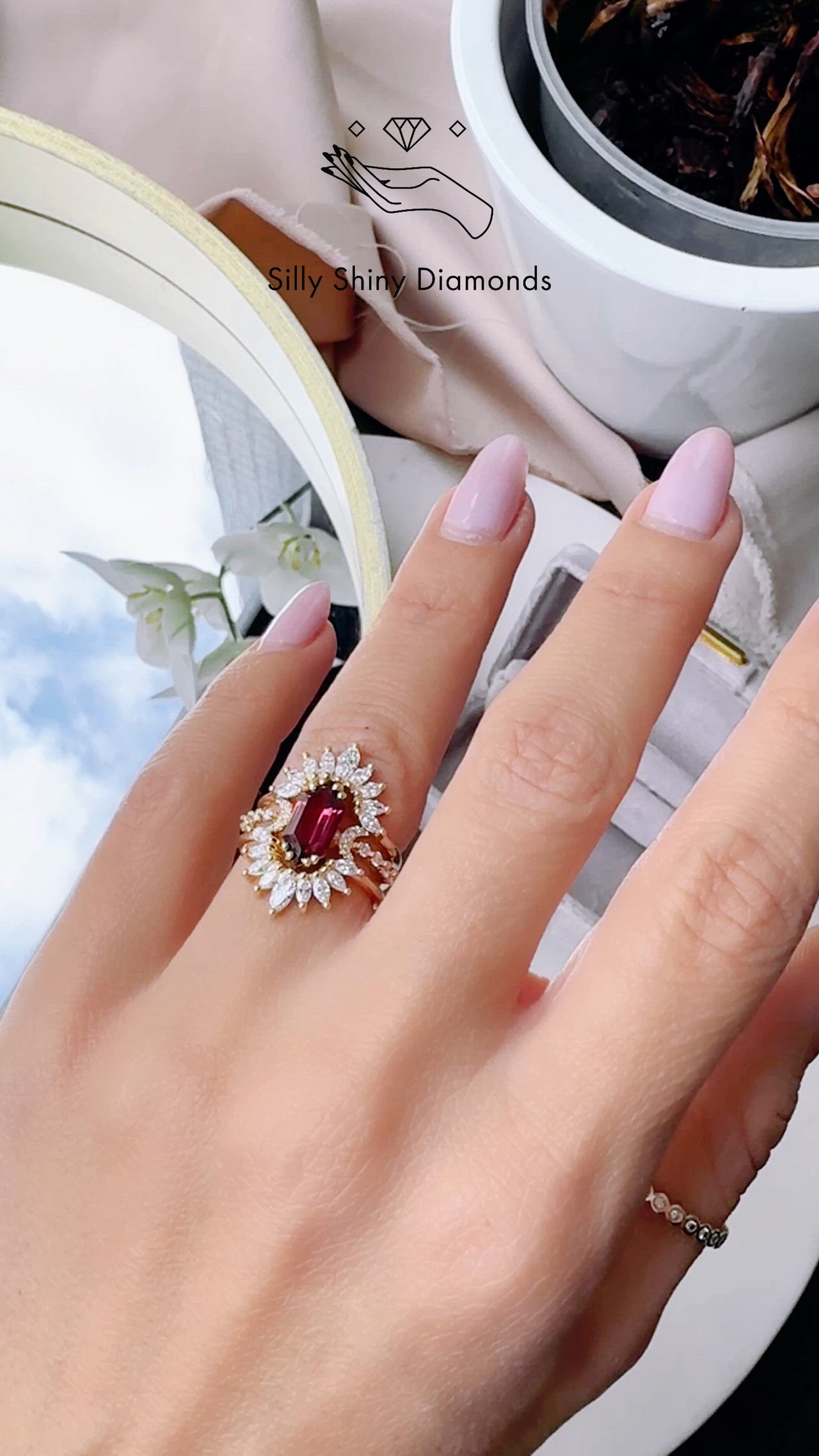 Elongated Hexagon Rhodolite Garnet Celestial Orbit Engagement Ring with two matching Sunburst Marquise diamond nesting rings. It's a gorgeous and unique three-bridal ring set. 

