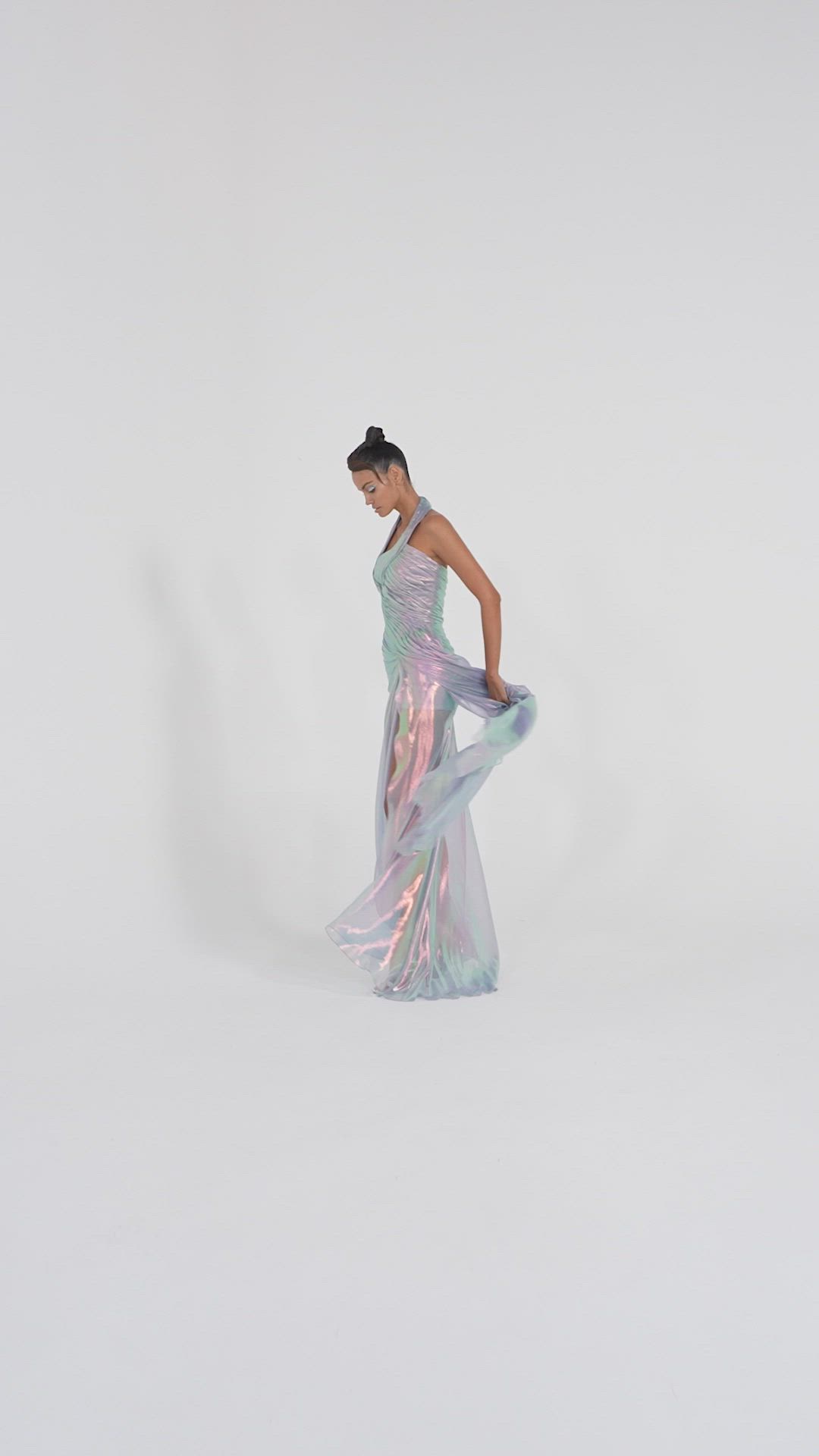 This contains an image of: Holographic mauve lurex draped gown featuring an asymmetric bodice