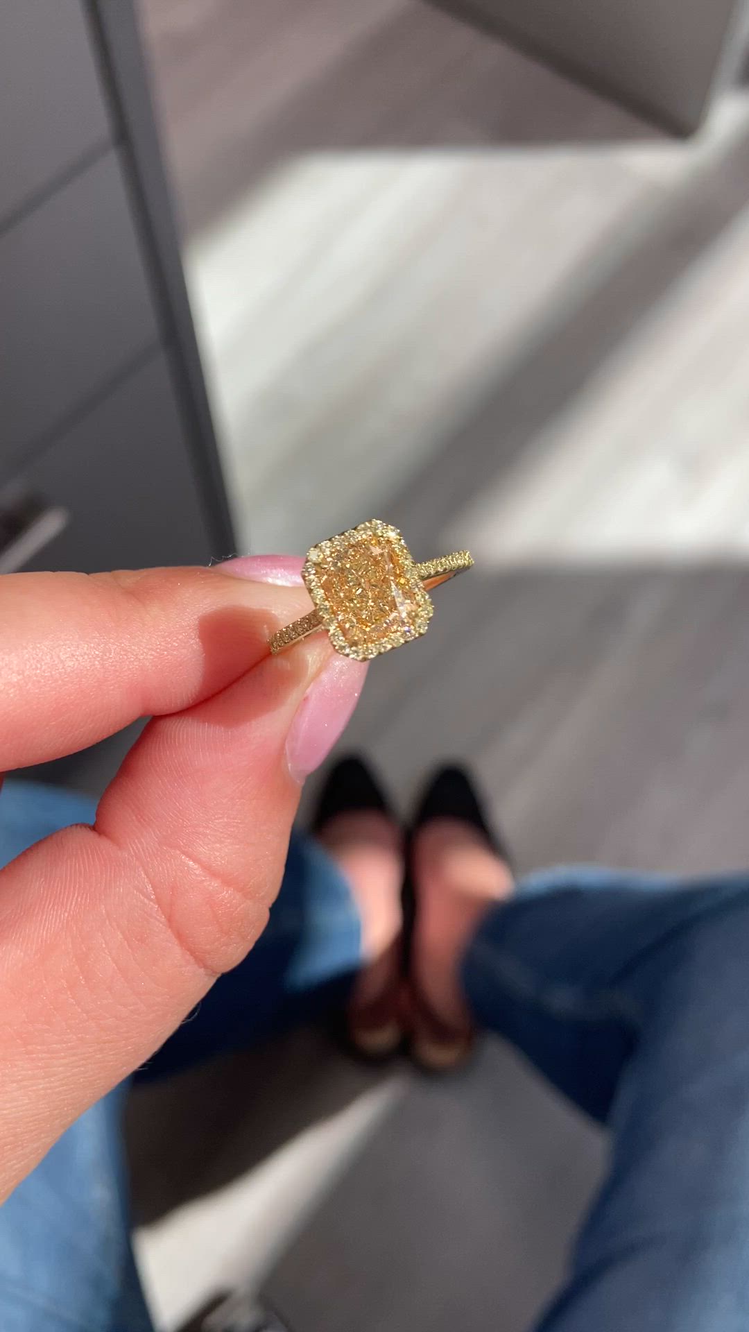 This contains: Unique yellow on yellow engagement ring, featuring a canary yellow radiant diamond with a yellow halo around it. The ultimate yellow diamond engagement ring. Radiant diamond engagement ring with halo