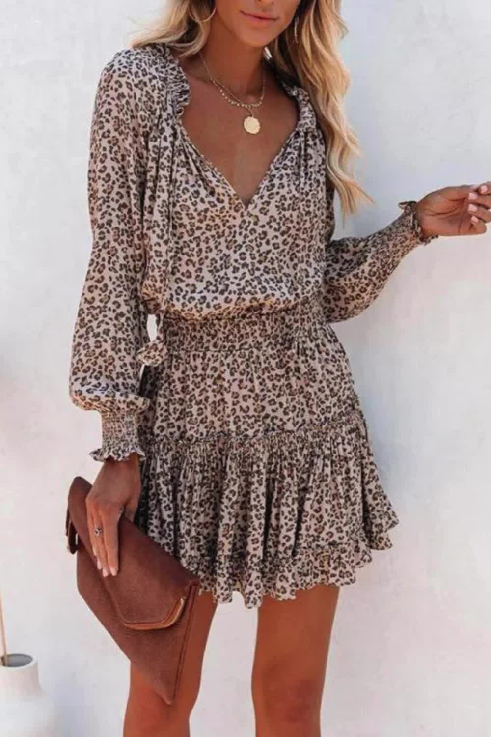 "Embrace elegance with our Women's Long Sleeve V Neck Fashion Printed Dress. Featuring a chic print and flattering V-neck, this dress is perfect for any stylish occasion."