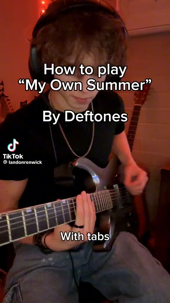 This may contain: a man sitting down playing an electric guitar with headphones on his ears and the words how to play my own summer? by deftones