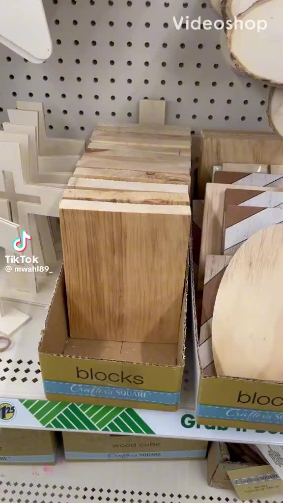 This may contain: two boxes of wood are stacked on top of each other