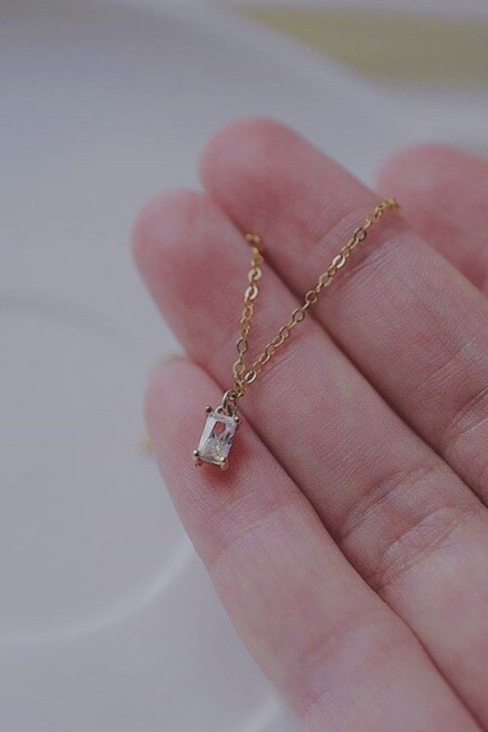 This contains: Rectangle CZ Dainty Necklace.