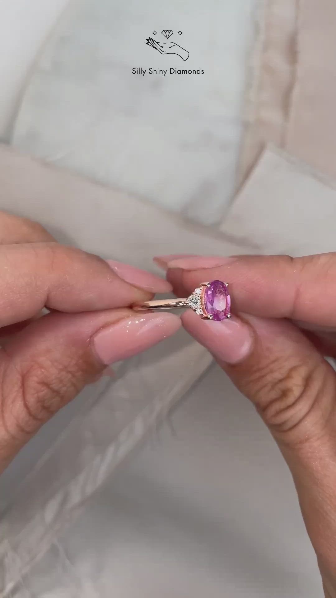 Unique oval hot pink Sapphire and diamonds Engagement Ring.