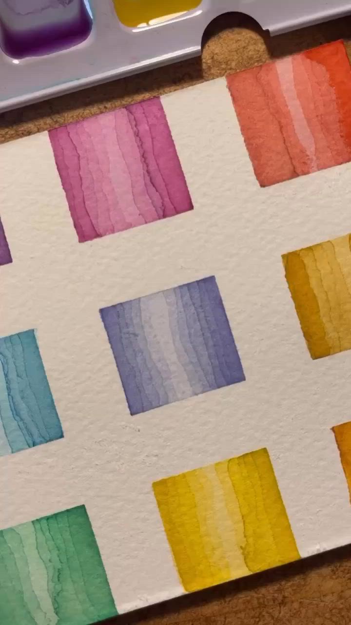 This may contain: the paint is being used to make an art project with watercolors on paper