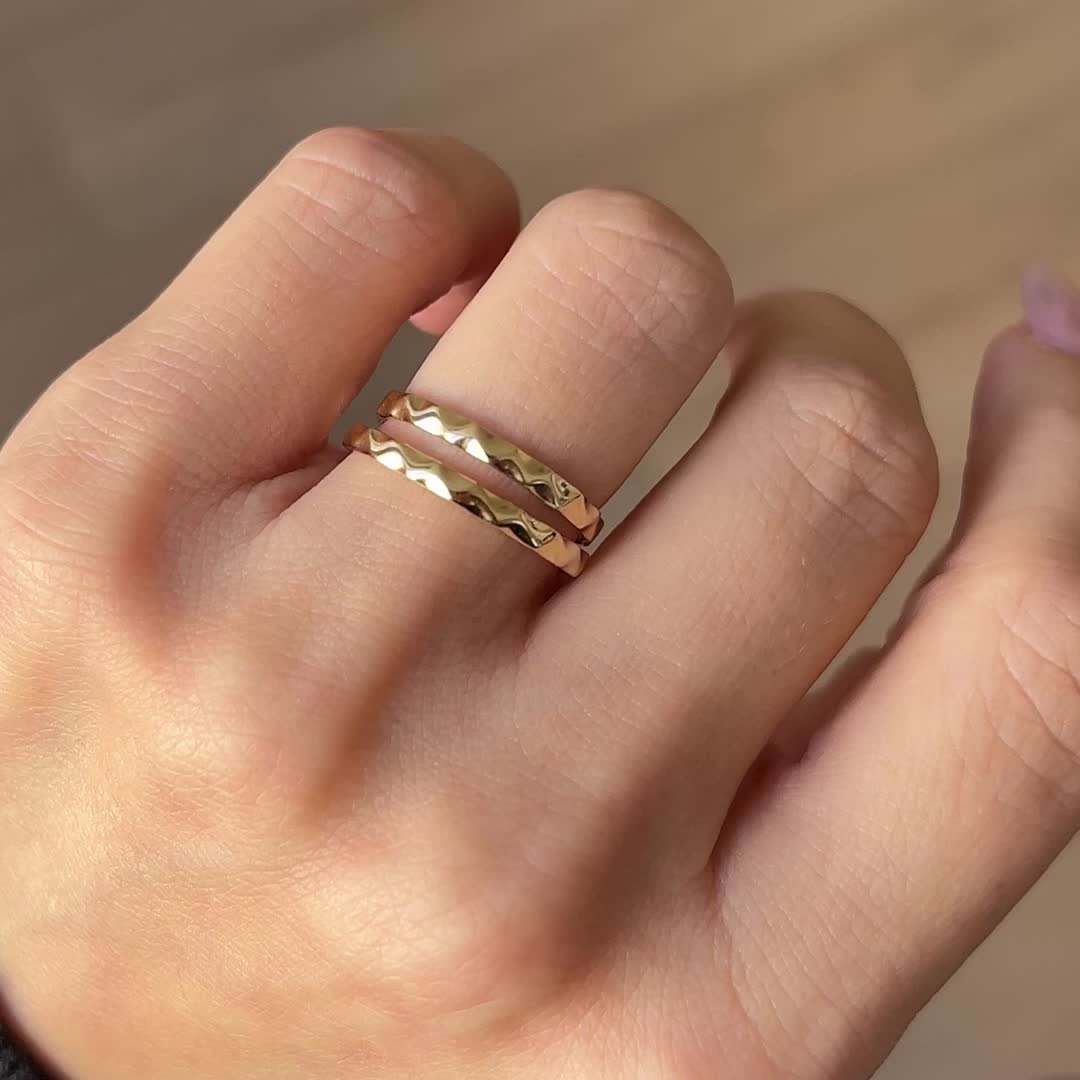 This beautifully hammered textured stacking band is the perfect mix of elegant & edgy and brings major shine to any ring stack. Carefully hand crafted by our artisan jewelers in 14K Gold. Comfortable for daily wear and pairs seamlessly with everything! Gift it, or treat yourself and hold onto it forever!

Size: Approx. 2mm (W)
14K Solid Gold
Lifetime Guarantee
Made in Los Angeles