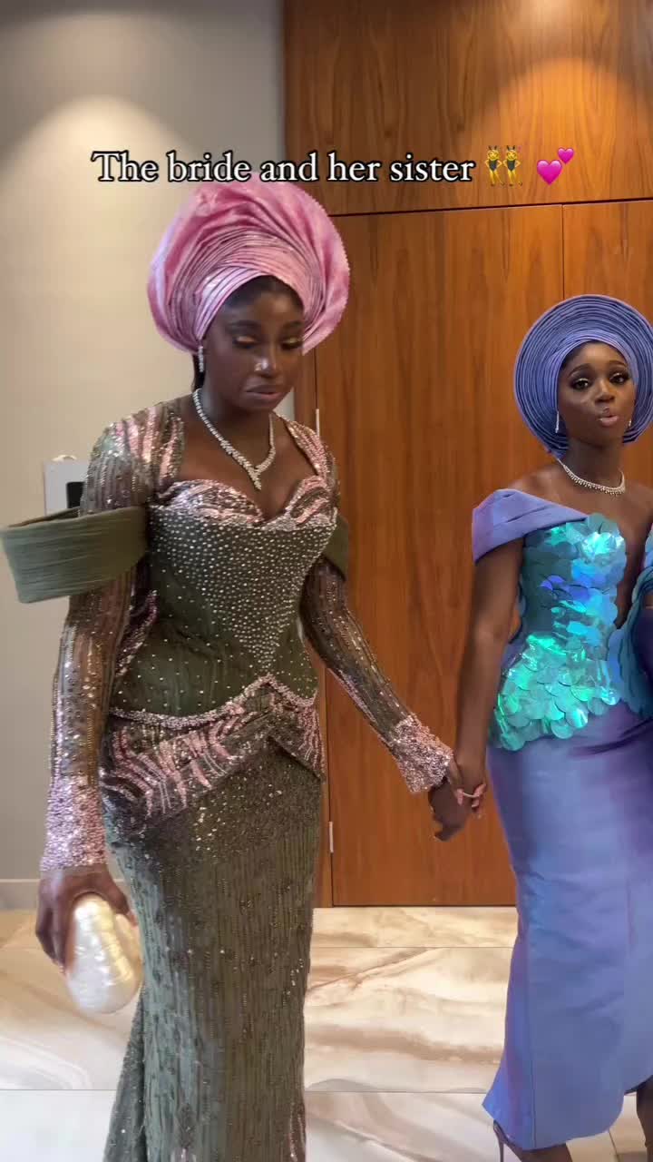 This contains an image of: A Yoruba Bride and her sister