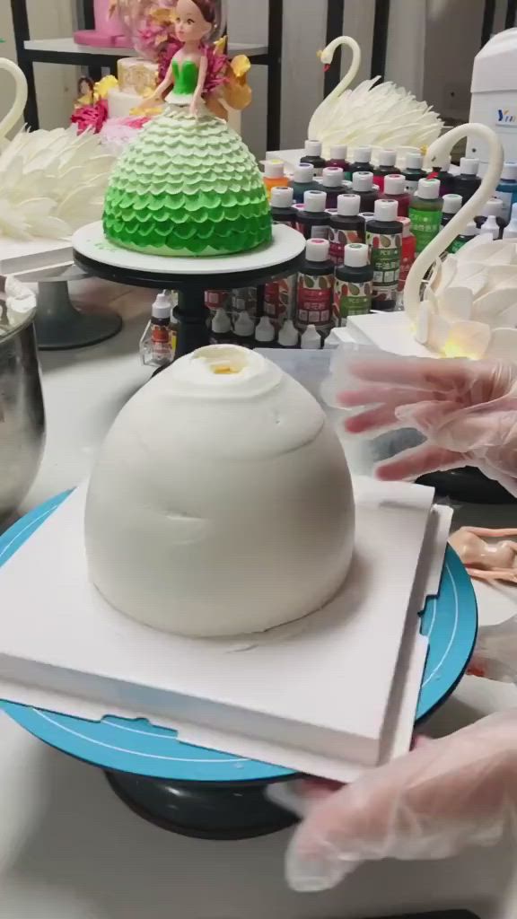 This may contain: there is a cake made to look like a dress