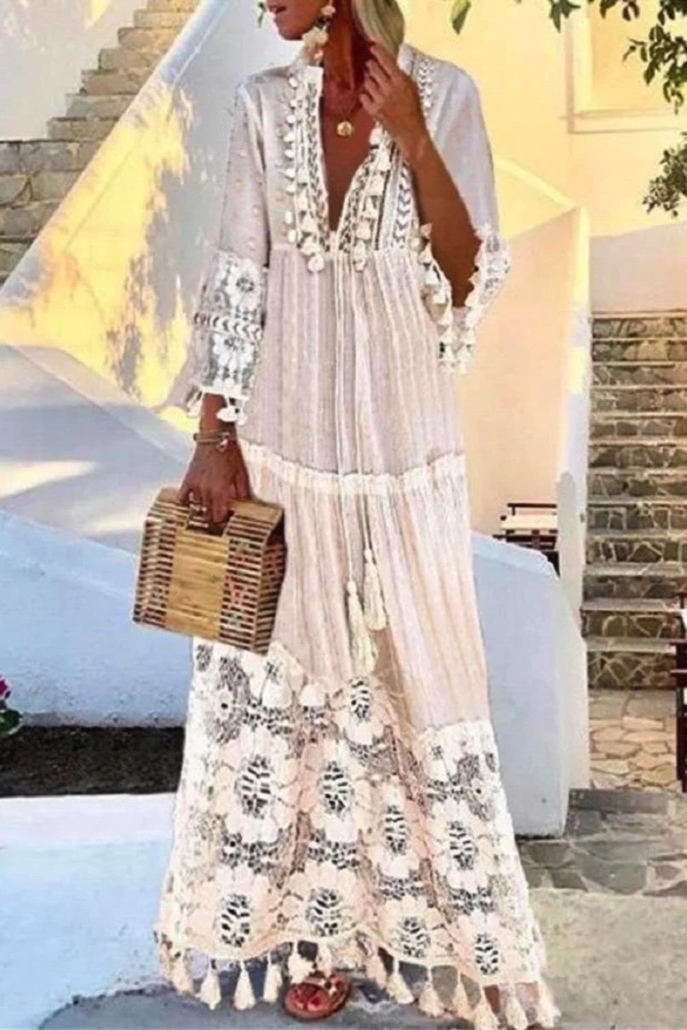 Drape yourself in elegance with our Fringed Lace Maxi Dress. This enchanting dress combines intricate lace details with playful fringe accents, creating a stunning bohemian-inspired look. The maxi length adds a touch of sophistication, making it perfect for special occasions or evening events.