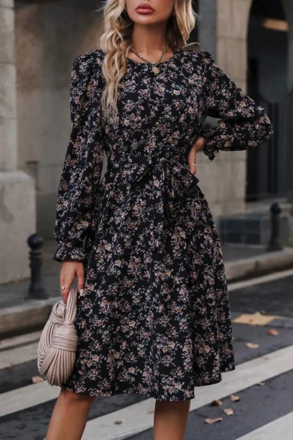 Elevate your style with our Black Long-sleeve V-neck Floral Dress. The chic combination of a classic black hue and a captivating floral pattern creates a timeless and sophisticated look. The V-neck and long sleeves add a touch of elegance, making it suitable for various occasions.