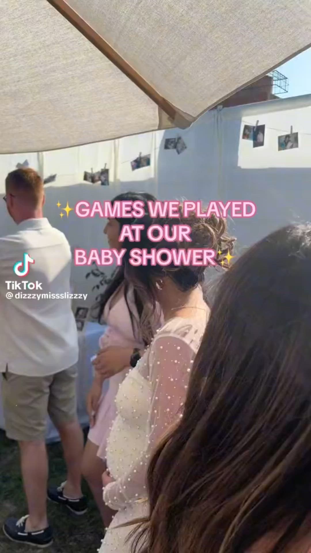 This may contain: some people are standing under an umbrella at a baby shower with the caption games we played at our baby shower