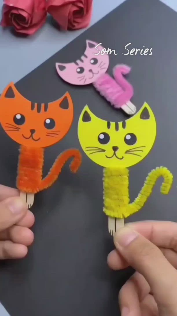 This may contain: two handmade cats on toothpicks with the words crafts for kids