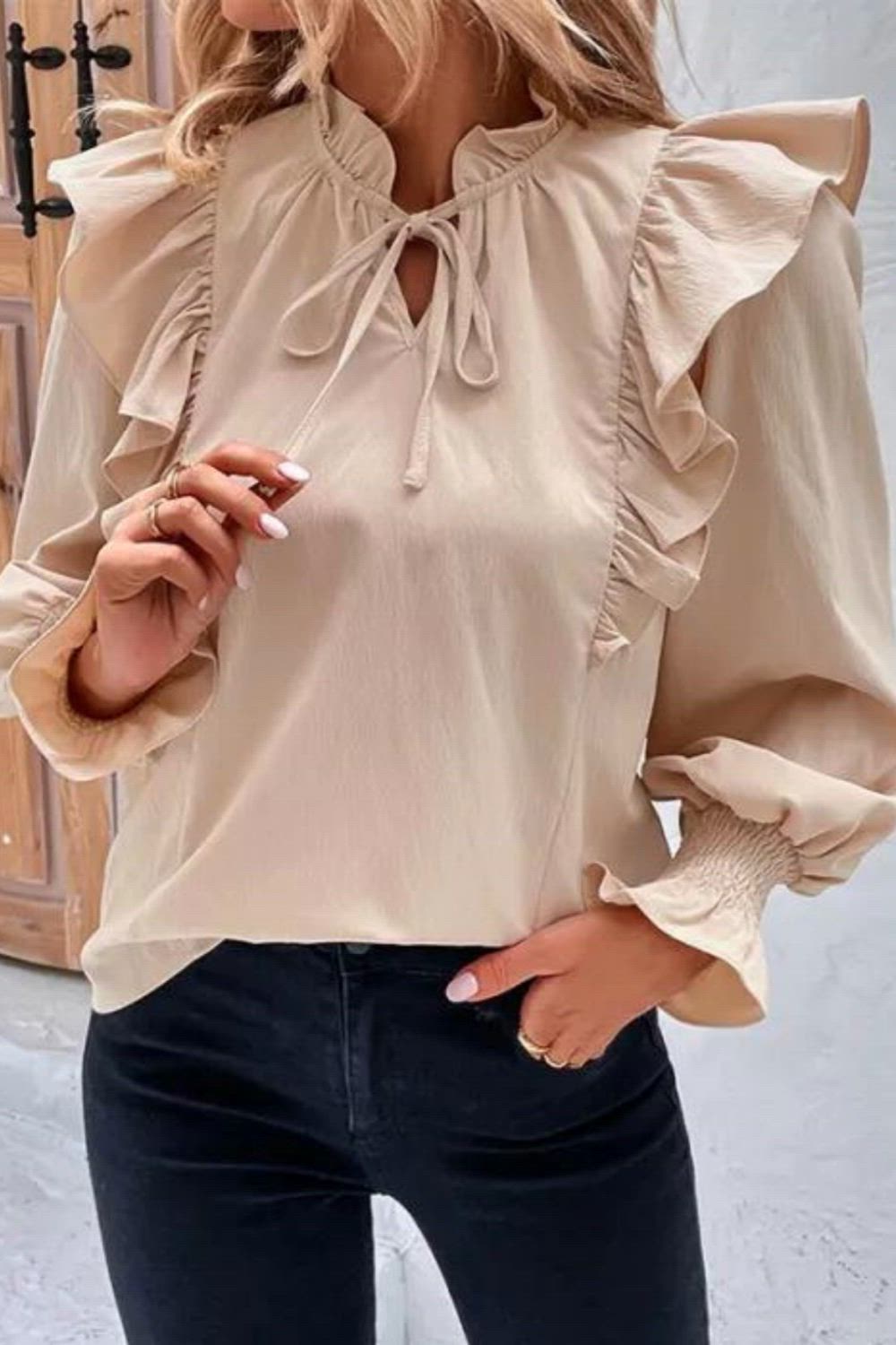 Elevate your style with our Women's New Ruffled Long Sleeve Solid Color Blouse. This chic blouse seamlessly blends fashion and elegance. With its stylish ruffled details and classic solid color design, it's the perfect choice for a sophisticated and timeless look. Upgrade your wardrobe with this fashionable and versatile addition, suitable for various occasions and seasons.