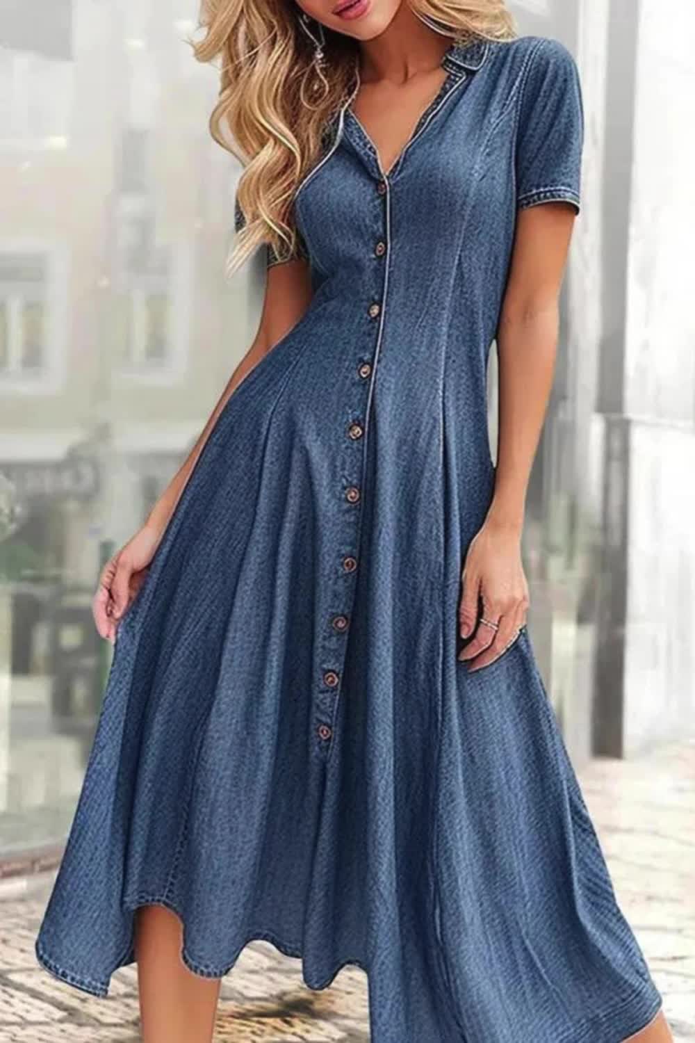 This denim midi dress features a high-waisted silhouette accentuated by button stitching, with short sleeves for a touch of casual charm. Versatile and stylish, it's perfect for adding a retro-inspired flair to your everyday wardrobe.