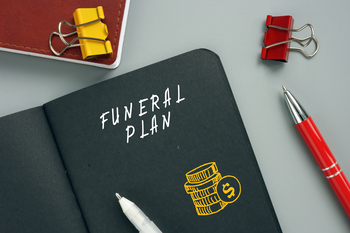 Journal that reads Funeral Plan