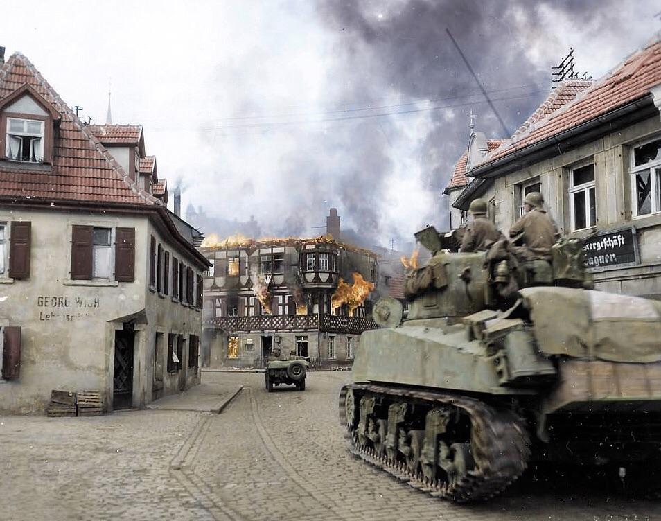 An M4A3 Sherman of the 11th Armored Division, 3rd US Army makes its way ...