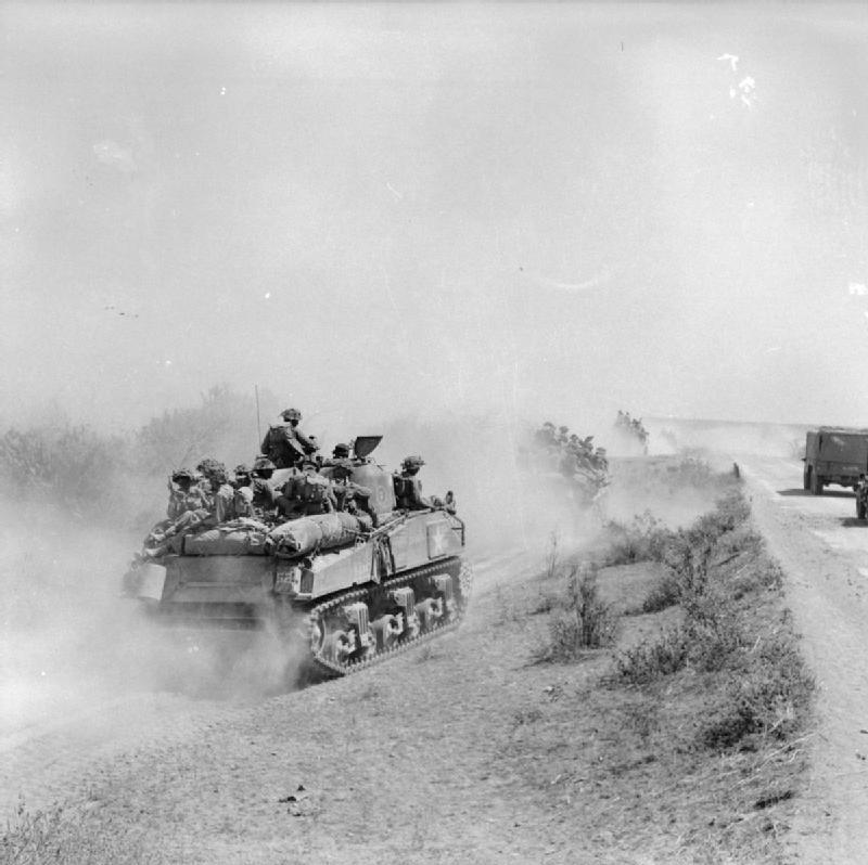 Sherman tanks and other vehicles start the journey from Mandalay south ...