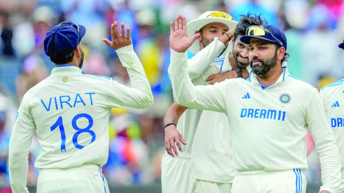 virat kohli and rohit sharma in action against australia during the test series photo afp