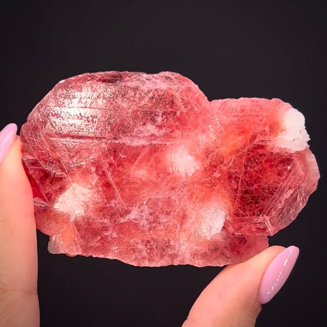 Rhodochrosite (twinned) on Feldspar