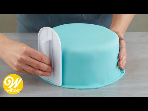 How to Cover a Round Cake with Fondant | Wilton - YouTube