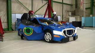 Japan engineers create robot that transforms into car with men on-board