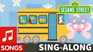 Sesame Street: Wheels on the Bus with Lyrics | Elmo's Sing-Along