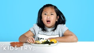 Kids Try Prison Food from Around the World | Kids Try | HiHo Kids