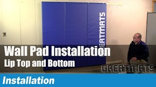 Shop Wall Pads Now: https://www.greatmats.com/gym-wall-pads.php

This video will show how to install wall pads that are Lip Top and Bottom from Greatmats. For this project you will need a tape measure, level, drill, screws, furring strips and a pencil.

Start by determining the location of the installation.

Then determine how many inches off the floor your wall pads will be installed.

In most cases, for custom pads, the pad height off the floor was determined during the CAD layout process. As a general rule, pads should be at least four inches above the finished floor.

Now double check the full height measurement of the pad.

Level a few marks or line across the wall at the bottom and top of the pads These marks will guide the installation of our furring strips.

The furring strips need to be installed above the bottom line -  and below the top line.

Now pre-fasten screws to the furring strip, using a level and a friend. Install the furring strips, making sure to connect to studs behind the wall.

The furring strips may need to be cut for length.

To ensure the top and bottom furring strips are aligned, use a level up from the bottom furring strip. Now install the top furring strip.

For wall pads with heights of 4 feet or greater, it's a good idea to include a third furring strip in the middle to the pads from flexing on impact and wrinkling.

Pre-fasten screws to the wall pads at the lip.

With a friend helping to hold the pads - install the wall pads to the furring strips. Use two screws on the top and two screws on the bottom of each wall pad.

We like to use torque head screws and a small washer can help secure the screws to the wall pads.

Now enjoy your new installation

#GreatWallPads #WallPadding