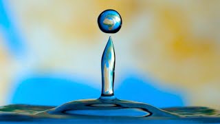 The Earth Inside a Macro Water Droplet - The Slow Mo Guys