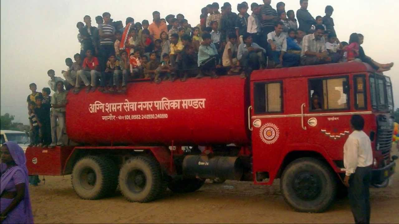 India Amazing Fire Brigade Overloaded People Seating Over It