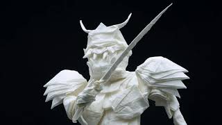 The folding process of origami Samurai Warrior