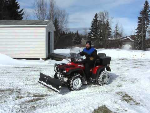 ATV clean up of nor'easter 2013 with Kimpex 60 inch manual lift plow