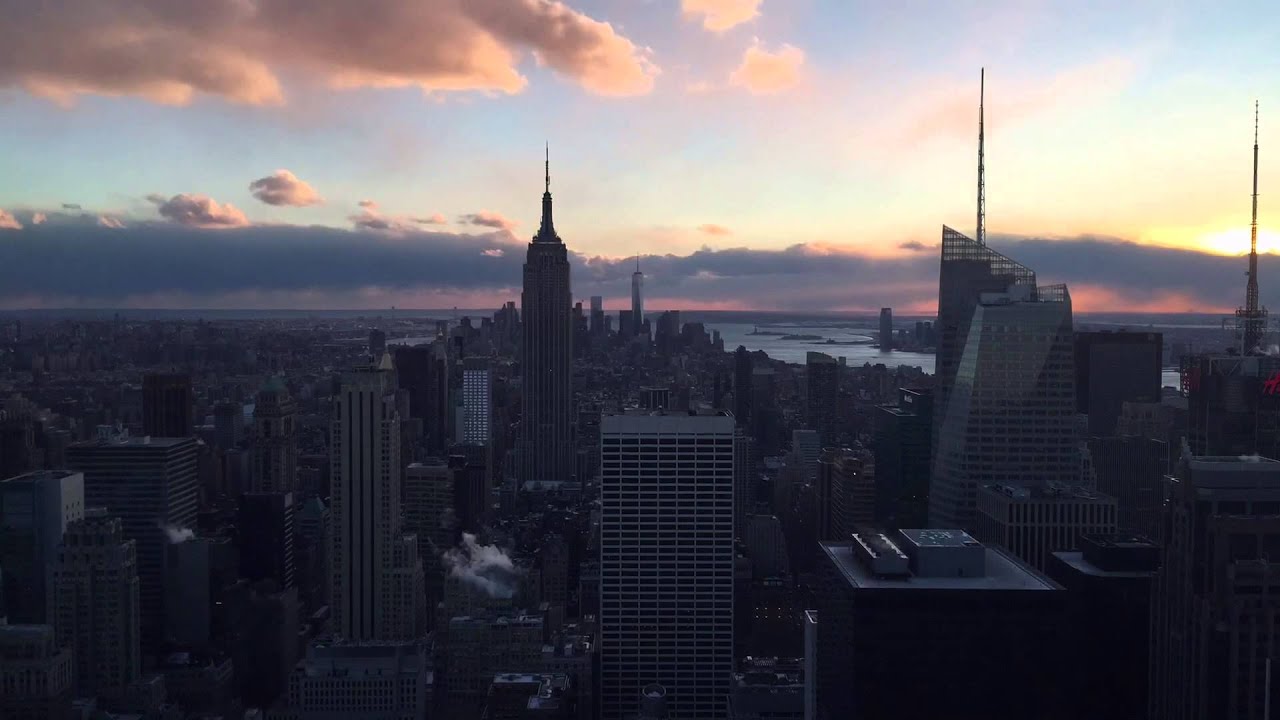 Sun setting over New York City time lapse - YouTube