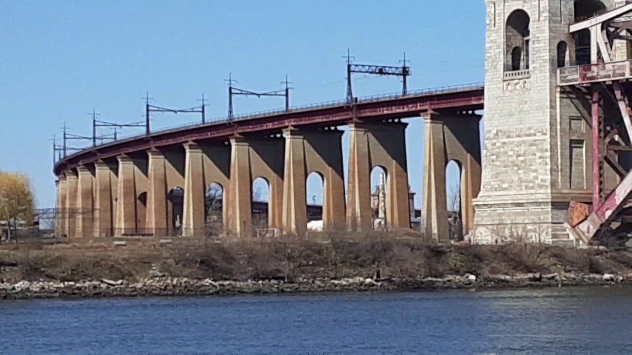 Acela Express crosses Hell gate bridge - YouTube