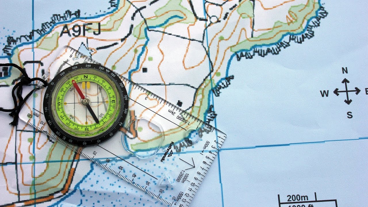 How to Navigate using a Compass and a Topographic Map - YouTube