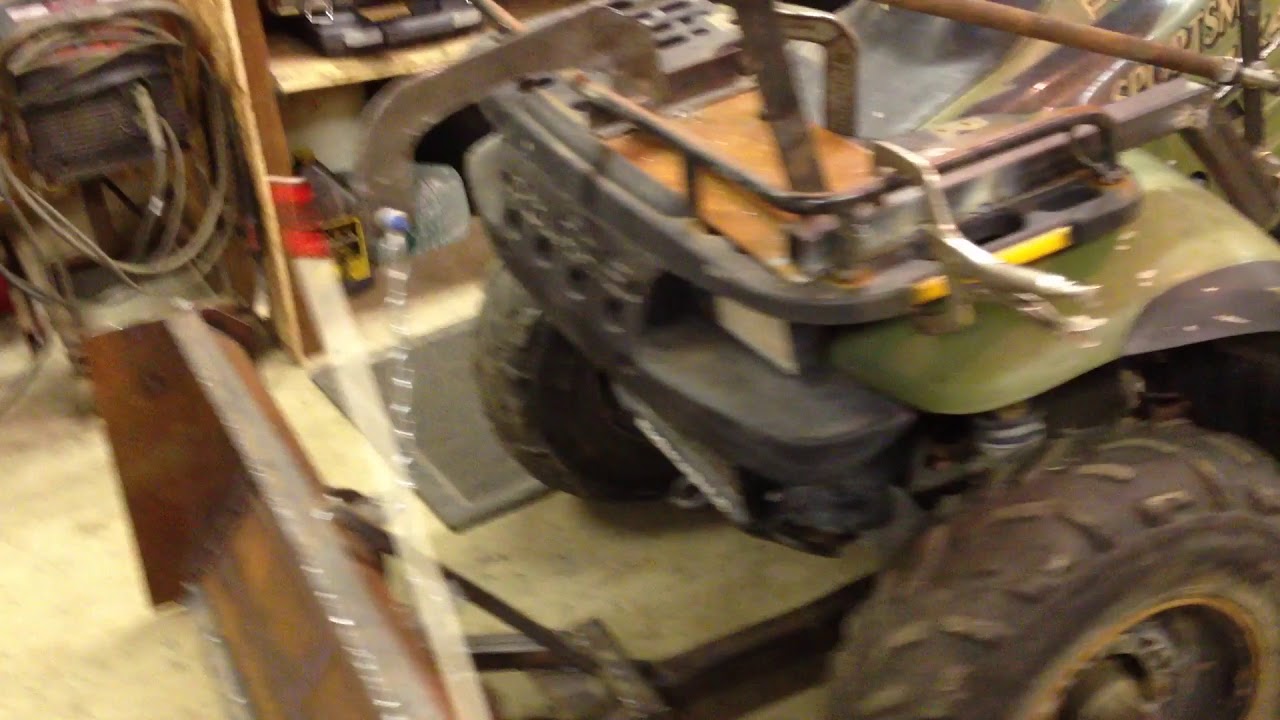 Manual atv snow plow lift - YouTube