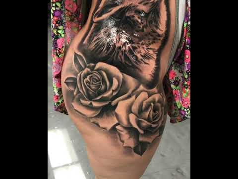 Wolf with roses tattoo - YouTube