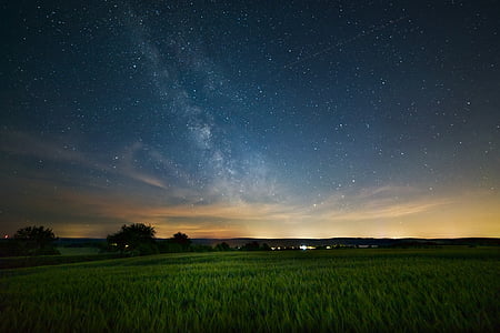 photo of green field and mountains