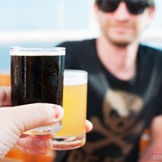 Randy Kalp of Speakeasy Travel Supply, tasting beers on the lanai of Red Frog Pub and Brewery on the Carnival Vista.