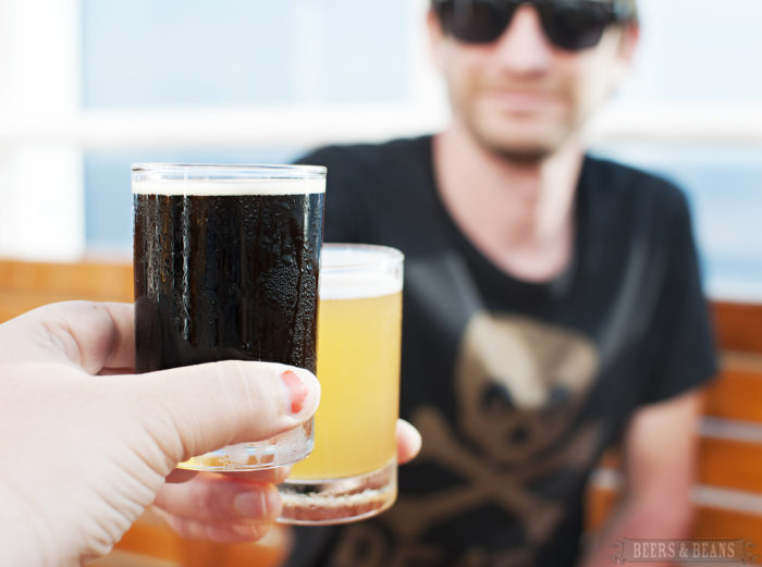 Randy Kalp of Speakeasy Travel Supply, tasting beers on the lanai of Red Frog Pub and Brewery on the Carnival Vista.