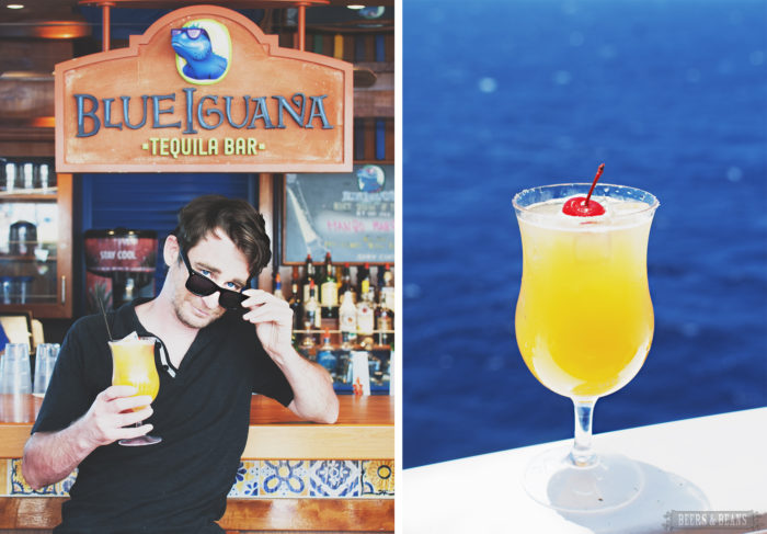 A traveler drinking cocktails at the Blue Iguana Bar on the Carnival Vista.