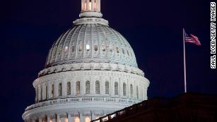 Trump signs massive budget deal after Congress votes to reopen government