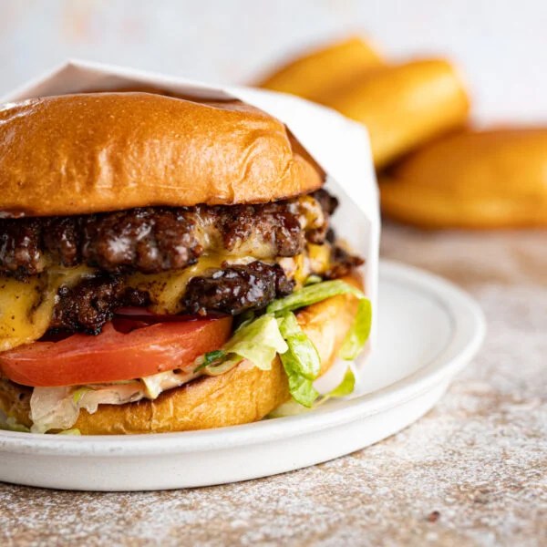 Close up of a juicy smash burger made from home.