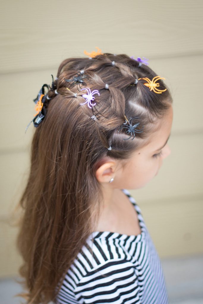 Your little girl will be wicked cute this Halloween with Dazzling Hospitality's Scary Easy Spiderweb Hair Tutorial! Includes hair, bow, and spider clip tutorial. www.dazzlinghospitality.com